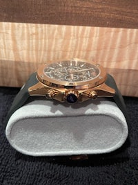 a watch sitting on top of a box